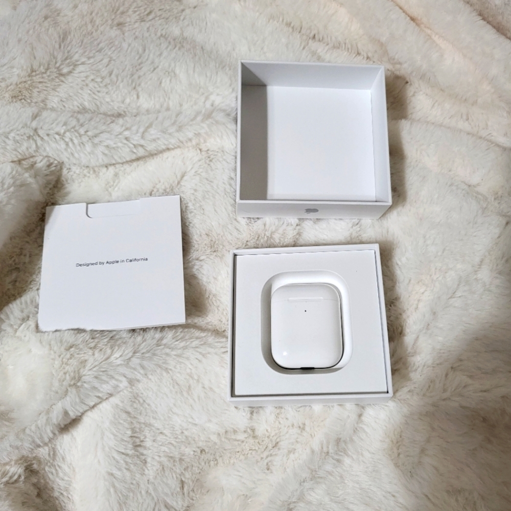 Apple Airpods Gen 2 with wireless charging case.